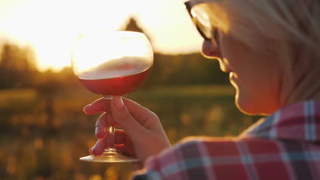 Woman-With-Wine-at-Sunset