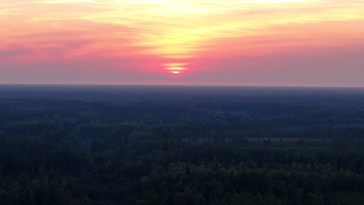 Beautiful Baltic Coastal Sunset Across A Verdant Forest Landscape In Aizpute, Kurzeme, Latvia.