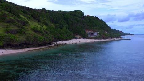 Tourist-At-The-Secluded-Beach-Of-Gunung-Payung-Near-Pandawa-Beach-In-Kuta-Selatan-,-Badung-,-Bali,-Indonesia