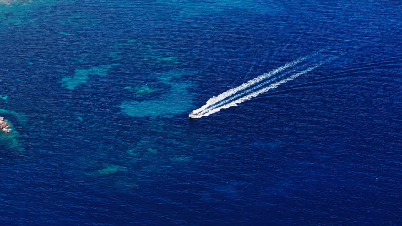 Aerial drone shot over the stunning rugged coastline of southern Corsica, France