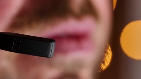 macro shot of a headset used by a worker in the office at night