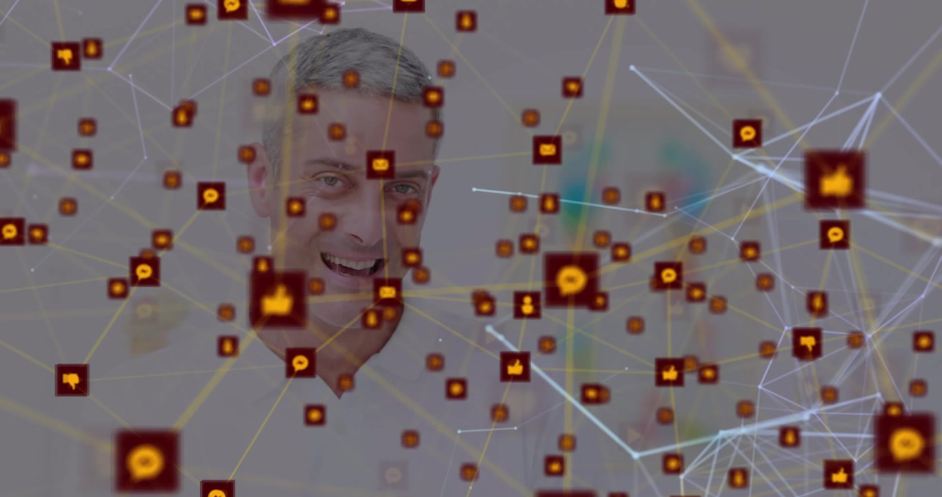 Animation of network of connections with icons over happy caucasian man
