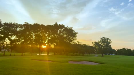 sunset view with trees and golf course