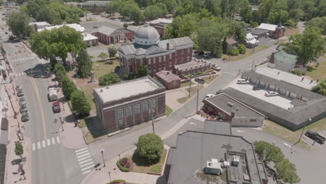 aerial view of a small town with historic courthouse and downtown area