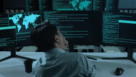man working in a server room