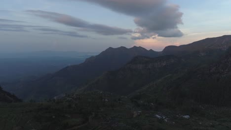 Cinematic-drone-shot---Zoom-out-shot-of-a-Village-located-on-a-cliff-in-Sri-Lanka