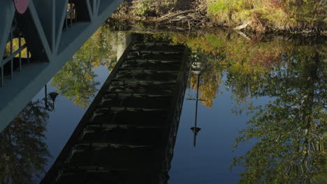 Autumn-in-Calgary,-Bridge-reflection-in-Canada