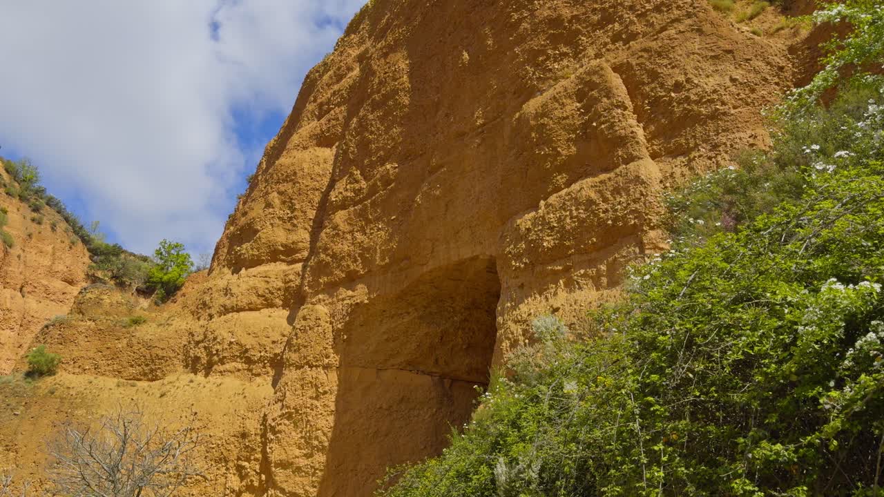 Outstanding Golden Mountains Surrounded By Vegetation With A Small Opening