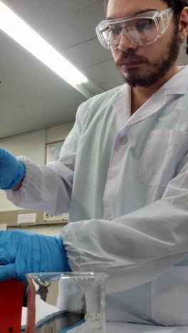 scientist conducting an experiment in a lab