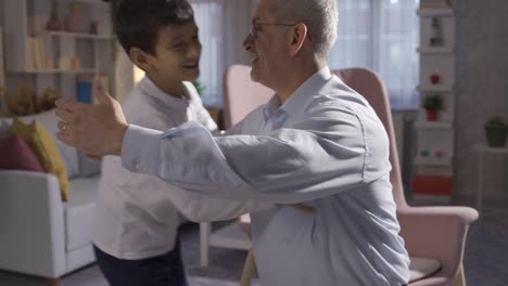 the longing father hugs his son.