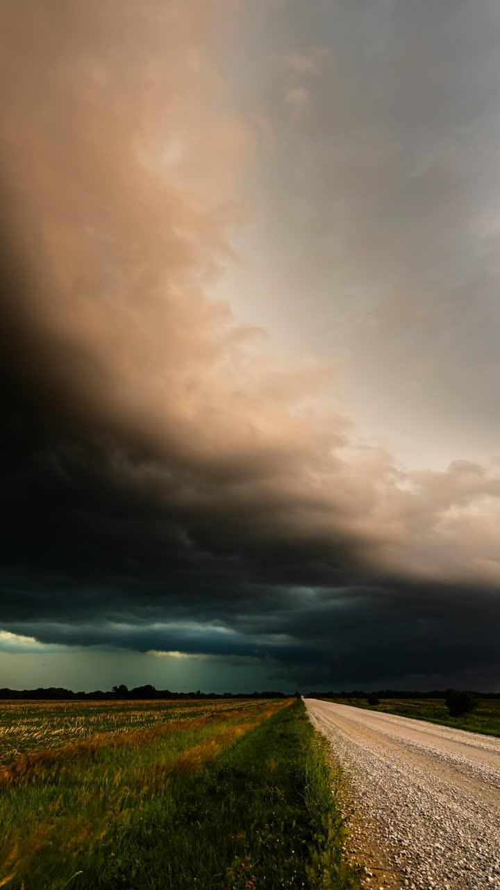 Storm clouds moving steadily with wind and heavy rain creating dramatic weather atmosphere outdoors