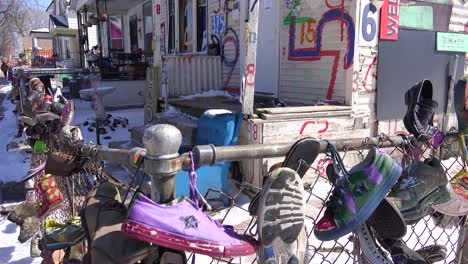 Shoes-hang-on-a-fence-in-a-ghetto-section-of-downtown-Detroit-Michigan