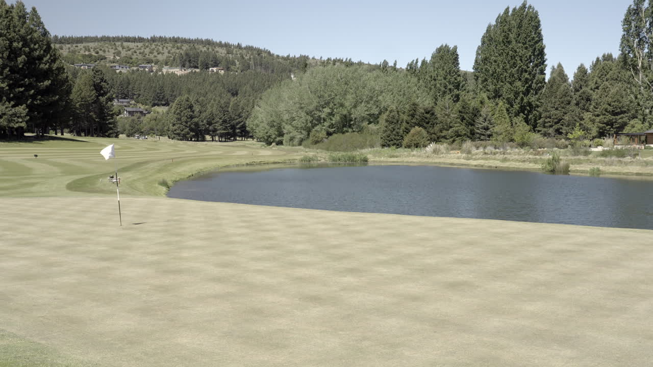Wide shot of golf course in beautifull surroundings