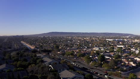 aerial rising shot of a south bay industrial community