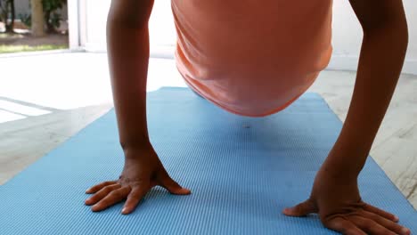 Close-up-of-teenage-girl-doing-pushup