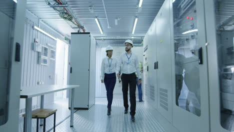 power plant engineers in control room