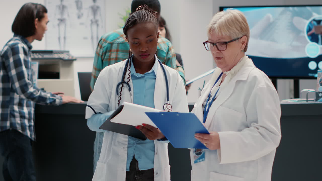 Doctors discussing patient care in a hospital waiting room