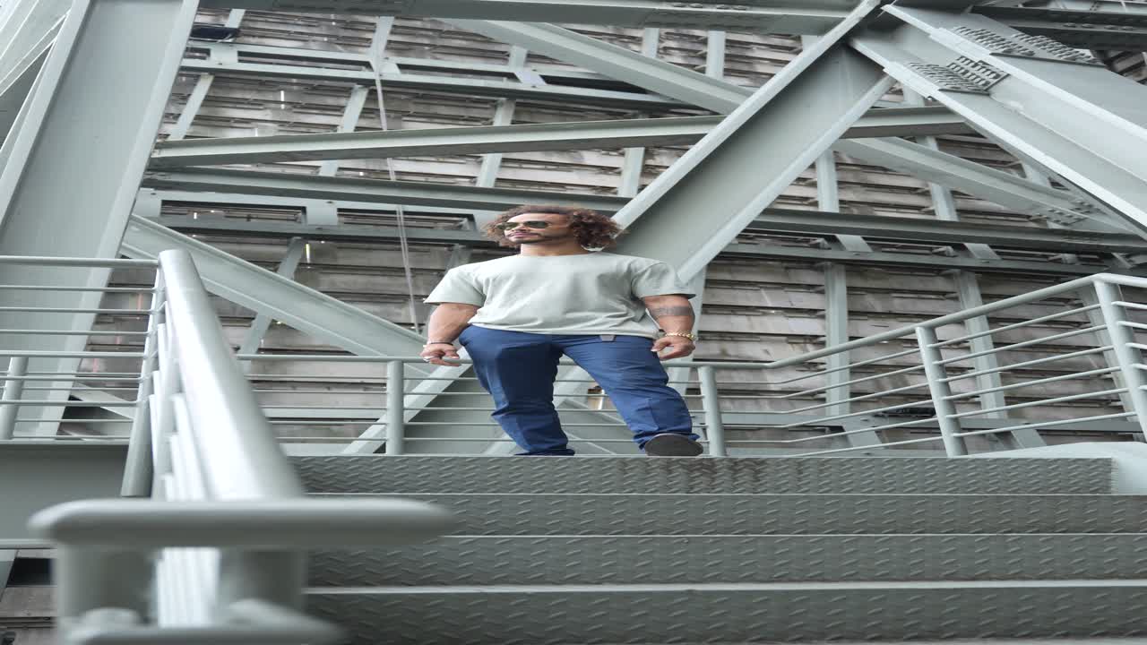 Man posing on stairs