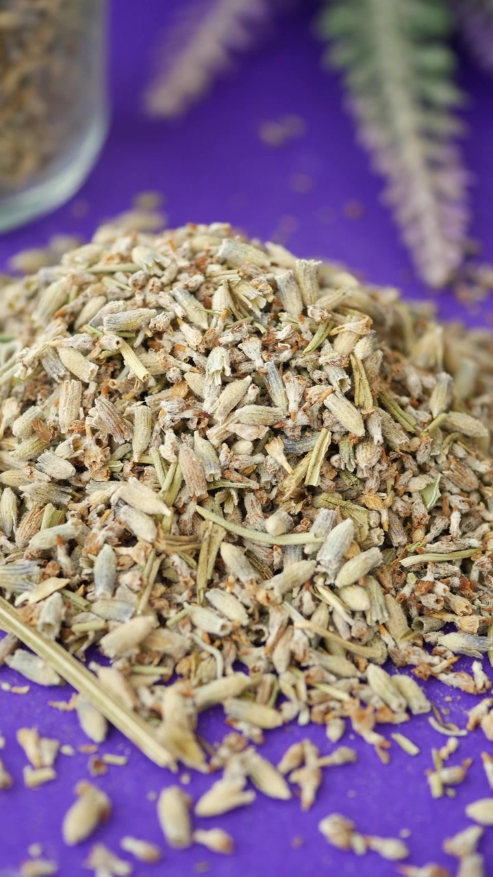 Dried Lavender Buds on a Vibrant Purple Background