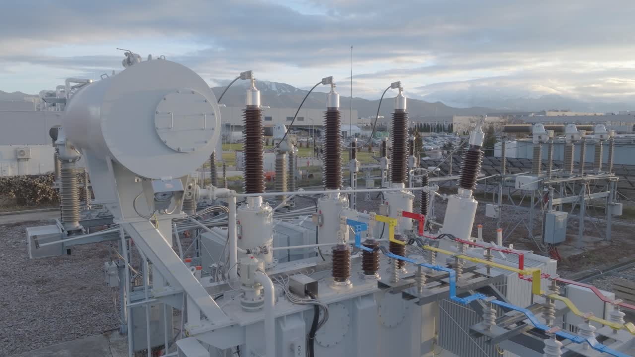 Aerial view of power station at dusk, calm and industrial scene