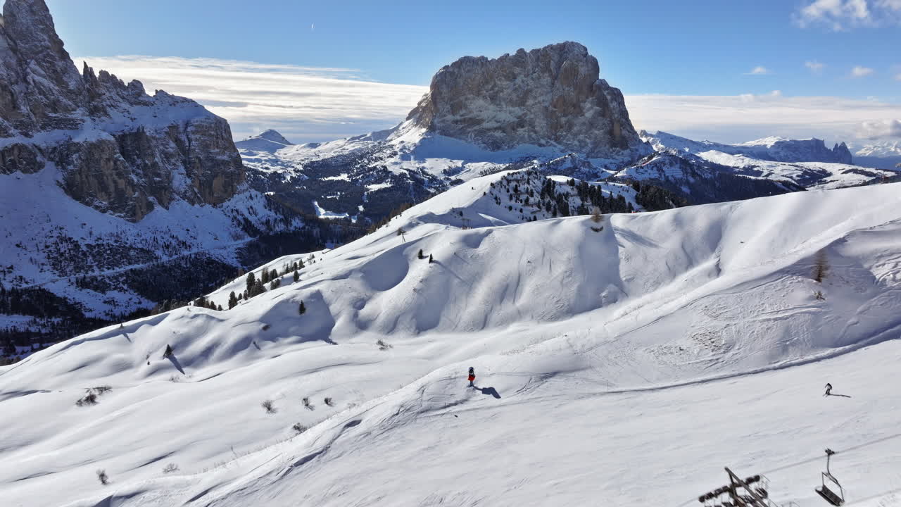 Aerial drone view of the Gardena Pass high mountain pass in the Dolomites, Italy