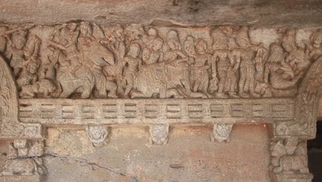 slow upward pan of hard carved temple in sri lanka