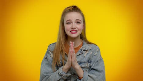 teen student girl praying, looking upward and making wish, asking god for help, begging apology