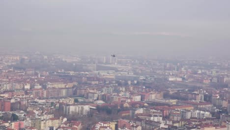 Helicopter-flying-over-Milan,-Italy