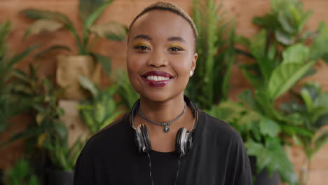 portrait of confident african american woman smiling enjoying lifestyle successful teenage student girl wearing trendy fashion slow motion real people series