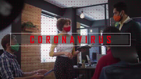 Animation-of-coronavirus-warning-text-over-team-of-colleagues-in-office-wearing-face-mask