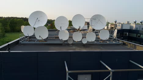 satellites dishes transmitting and receiving digital television broadcast signals