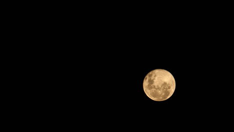 orange full moon moonrise time lapse, pitch black, dark night background