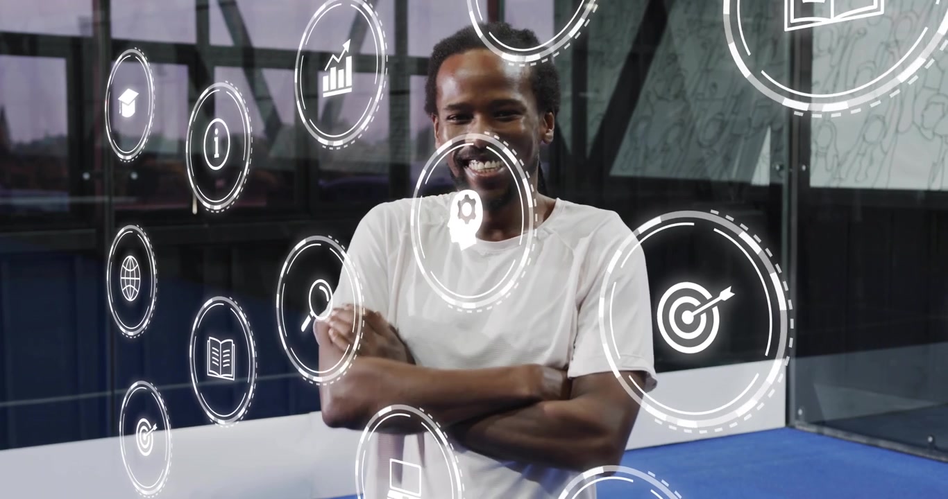 Man wearing white T-shirt shifting and smiling with holographic tech icons appearing around him