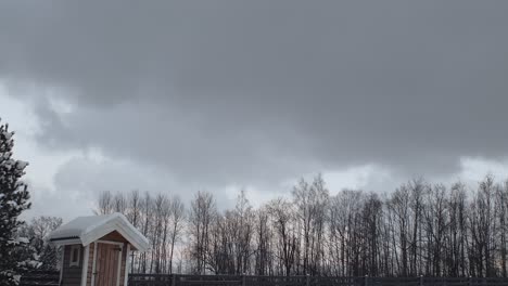 moving clouds over winter landscape. time-lapse