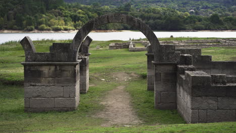 wide shot of arche of the entrance of aquis querquennis, an arqueologic complex former roman military camp in bande, ourense, spain