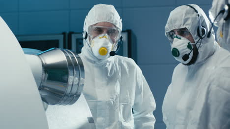 industrial team inspecting machinery