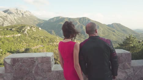 couple enjoying panoramic mountain view