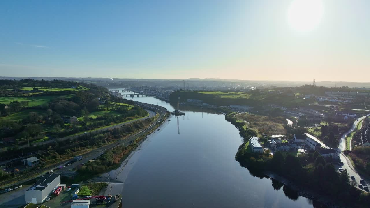 Waterford City Ireland drone approaching City early morning with bridges coming into view bright autumn morning