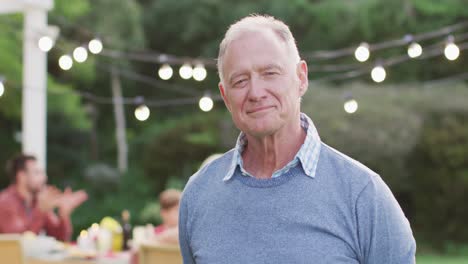 senior man smiling outdoors
