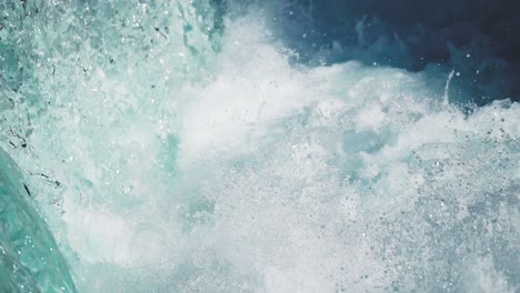 close-up view of a powerful wave impact, showcasing the energy and force of the ocean