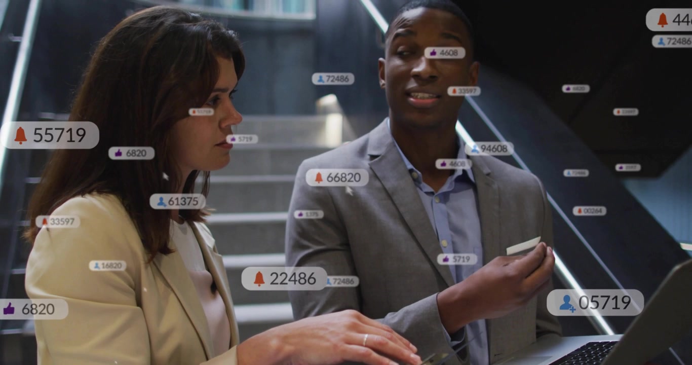 Woman placing hand on reader, man typing laptop, HUD notifications multiplying for business access