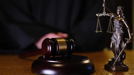 a detailed courtroom scene featuring a prominent gavel alongside lady justice, symbolizing law and order
