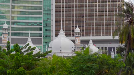 handheld shot of the masjid jamek mosque nearby the merdeka square, kuala lumpur, malaysia