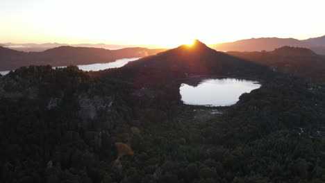 AERIAL---Sunset-on-Nahuel-Huapi-lake,-Rio-Negro,-Patagonia,-Argentina,-truck-left