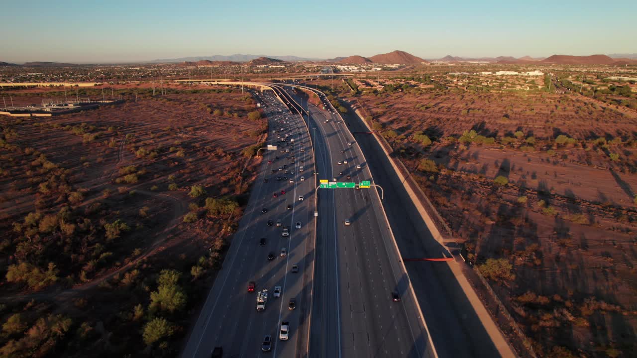 Aerial shot of sunrise highway commute traffic, Phoenix, Arizona desert, 4K