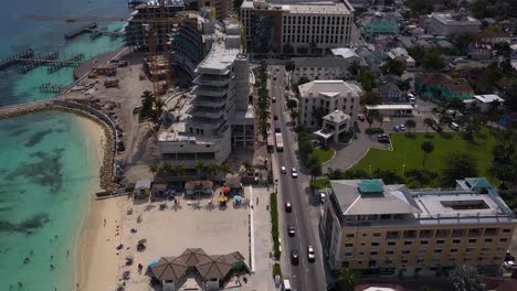 Aerial-view-of-traffic-in-downtown-Nassau-in-the-Bahamas-islands---tilt,-drone-shot