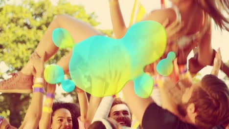 green gradient liquid shape against group of people carrying a girl on their hands at a concert