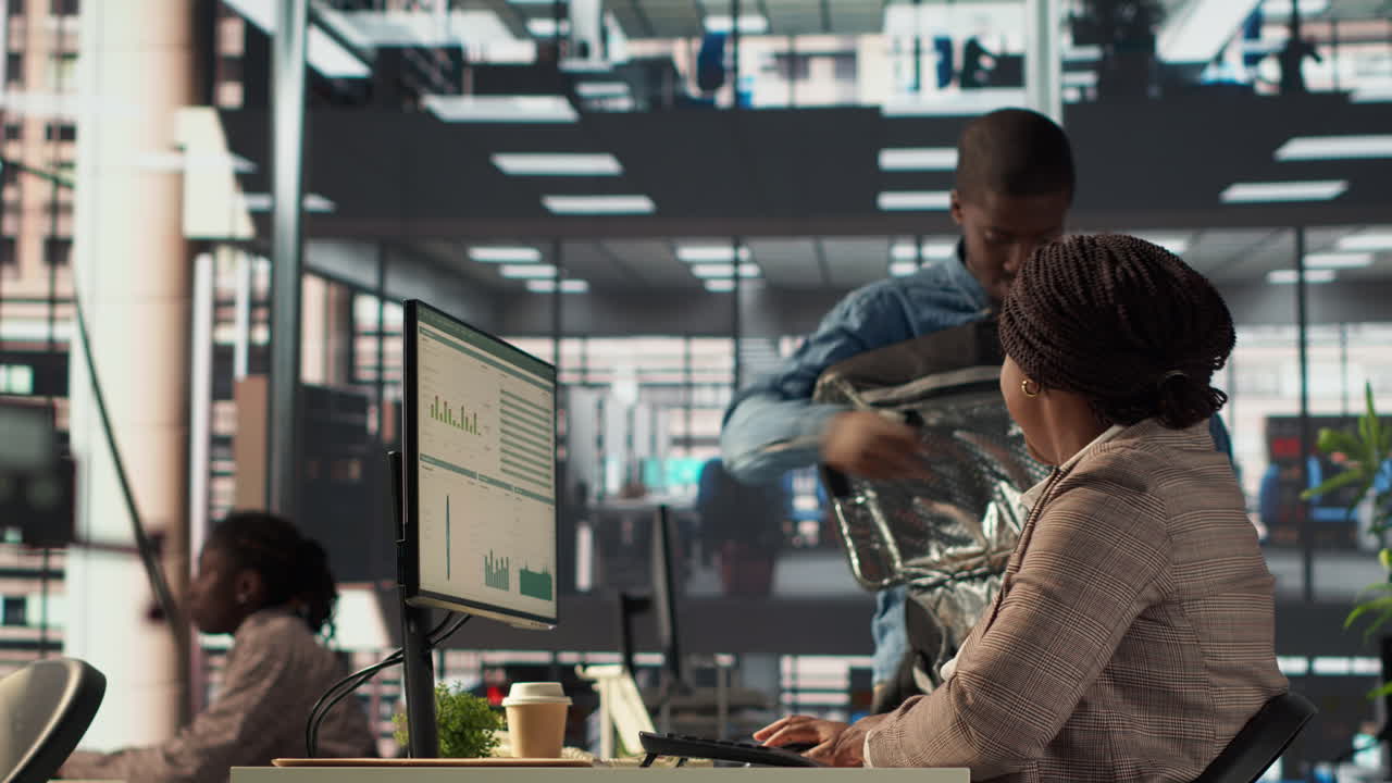 Business People in Office During Lunch Break