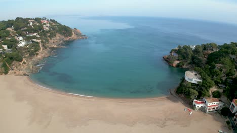 Discover-the-Unspoiled-Nature-of-Sa-Riera's-Coastal-Landscape-and-a-Spectacular-Turquoise-Beach-on-the-Costa-Brava