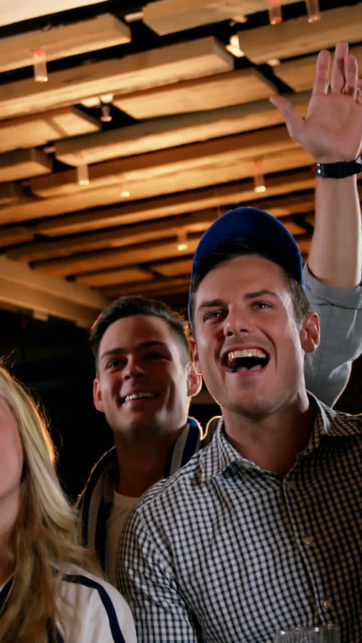 Group of friends watching tv